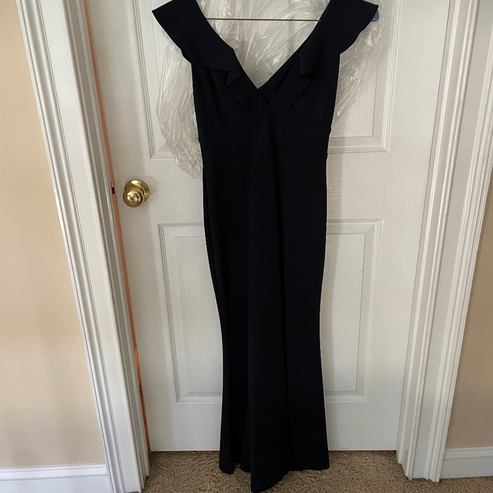 Navy dress with ruffle detail.